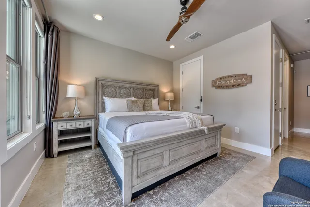 a bed room with a bed and a window