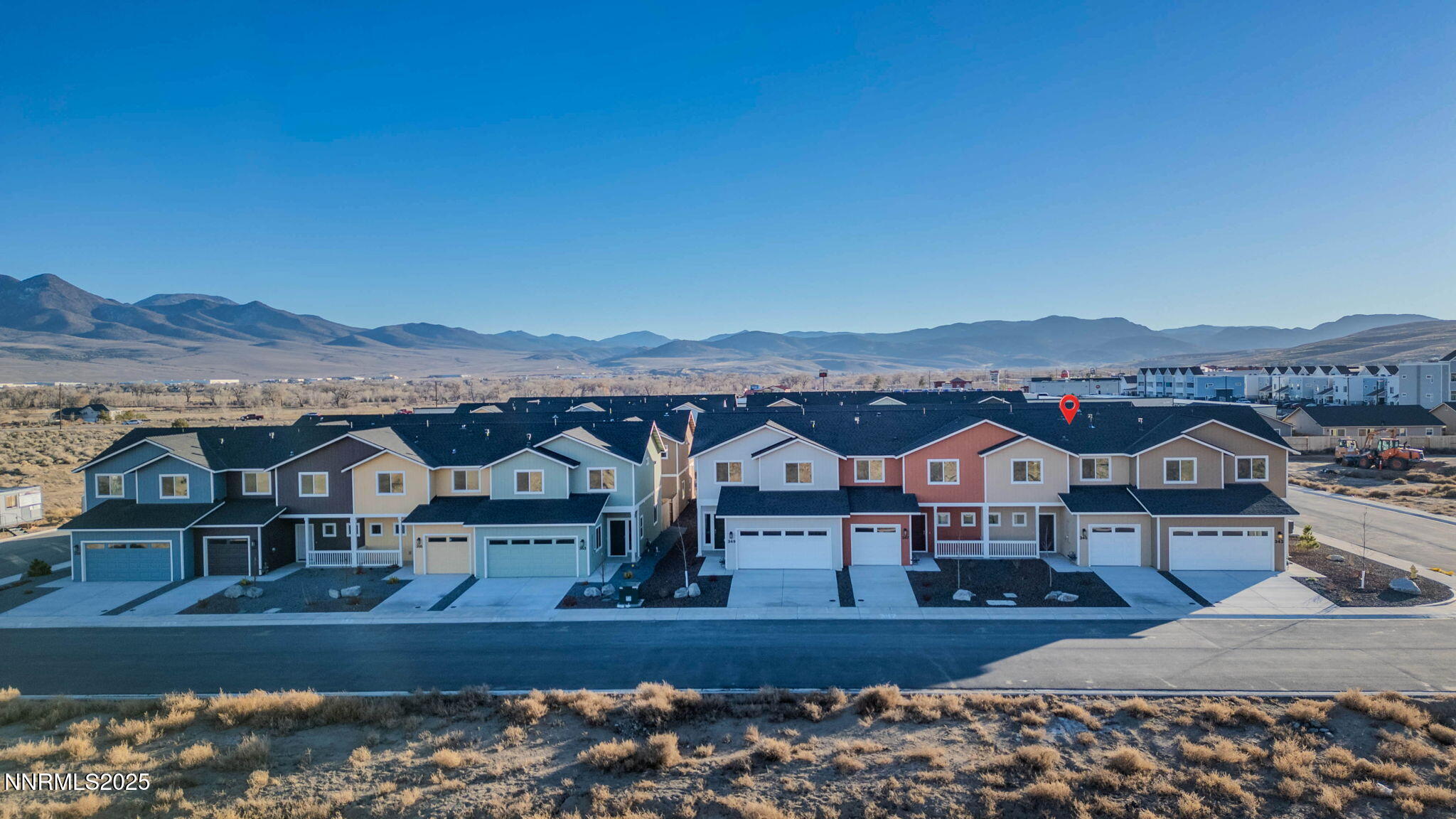 345 Halite Drive Dayton, NV 89403 - Photo 3 of 24 a view of house with wooden deck and mountain view
