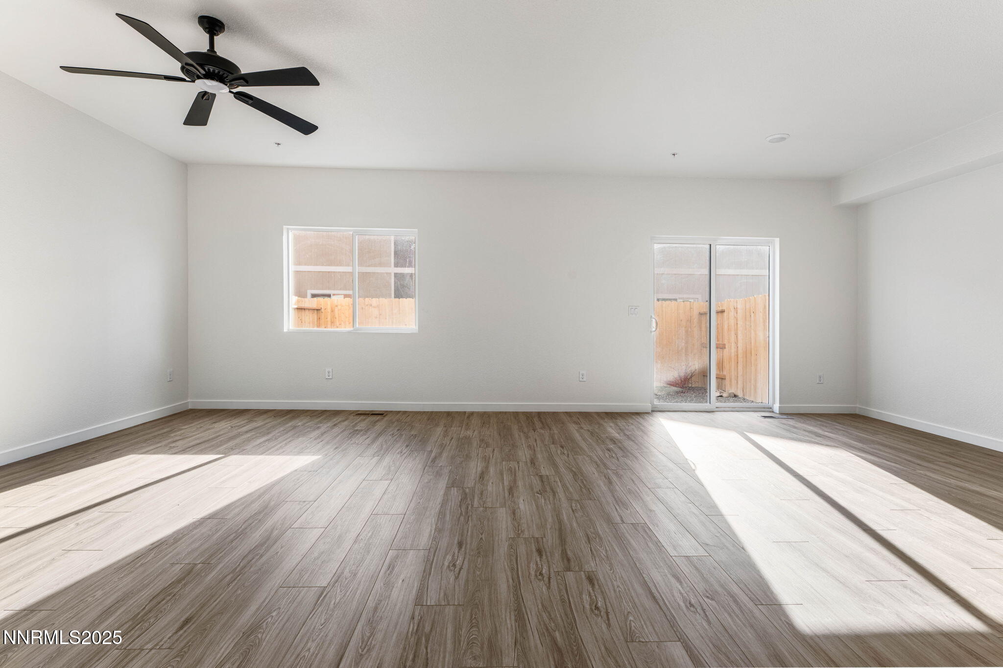 345 Halite Drive Dayton, NV 89403 - Photo 4 of 24 wooden floor in an empty room with a window