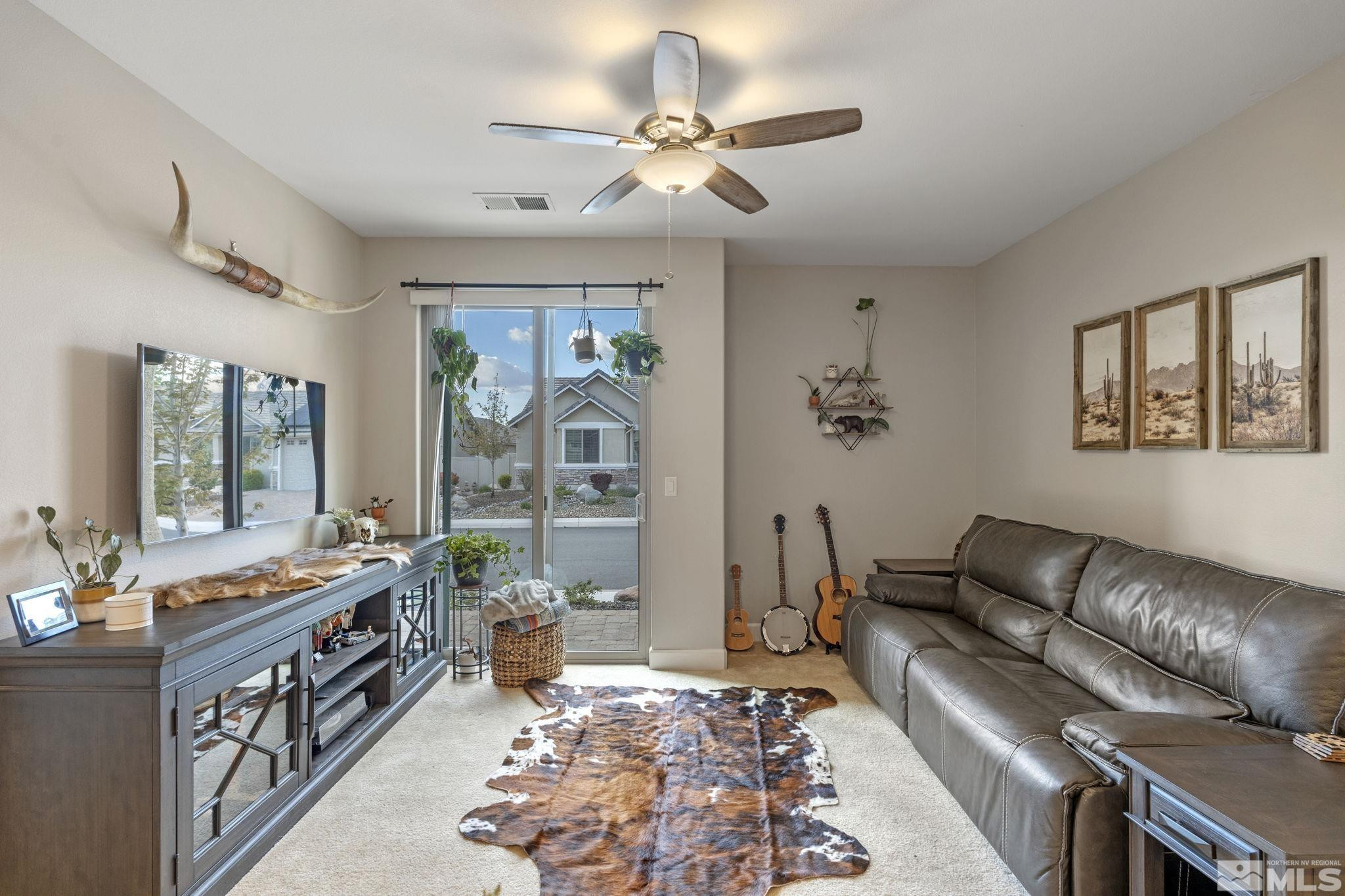 508 Alpine Rose Ct. Reno, NV 89521 - Photo 27 of 39 a living room with furniture and a window