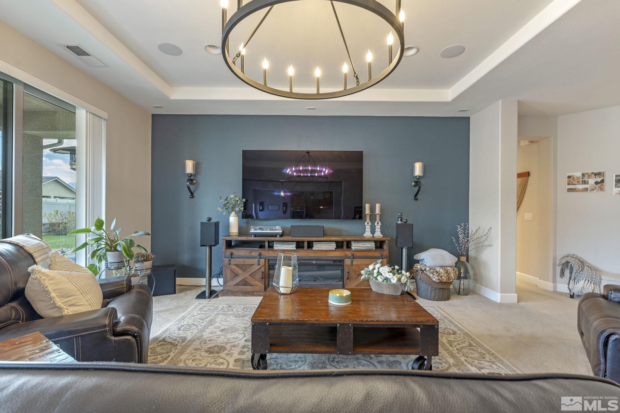 508 Alpine Rose Ct. Reno, NV 89521 - Photo 9 of 39 a living room with furniture and a flat screen tv