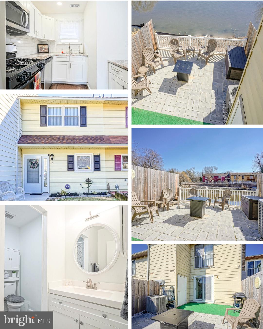 a view of kitchen with stainless steel appliances kitchen island granite countertop a sink and stove