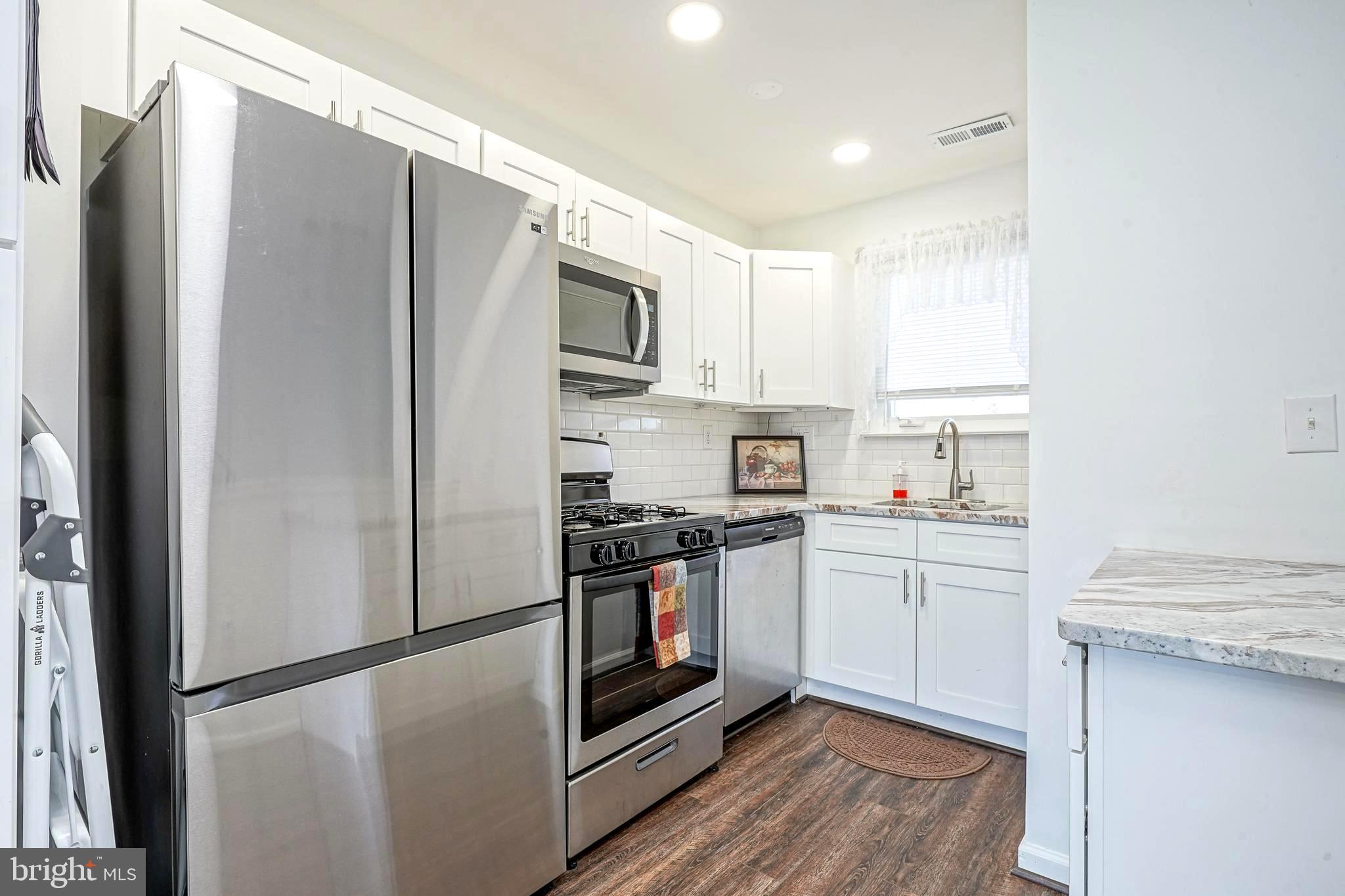 5 Via Cascata Drive Clementon, NJ 08021 - Photo 13 of 26 a kitchen with stainless steel appliances a refrigerator sink and microwave