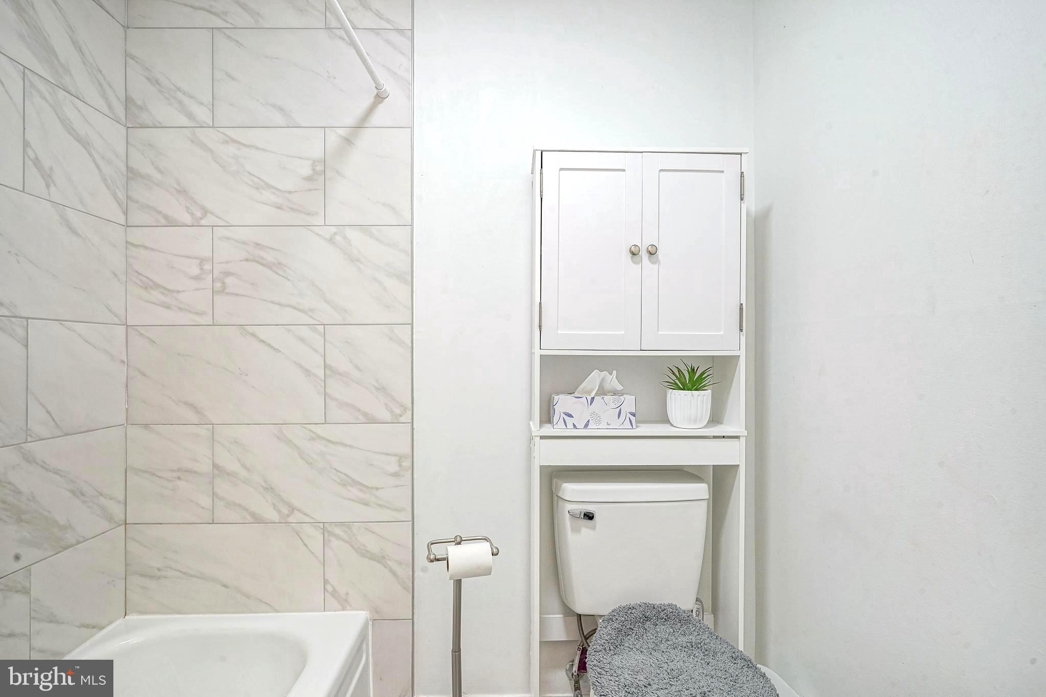 5 Via Cascata Drive Clementon, NJ 08021 - Photo 23 of 26 a bathroom with a toilet a sink and mirror