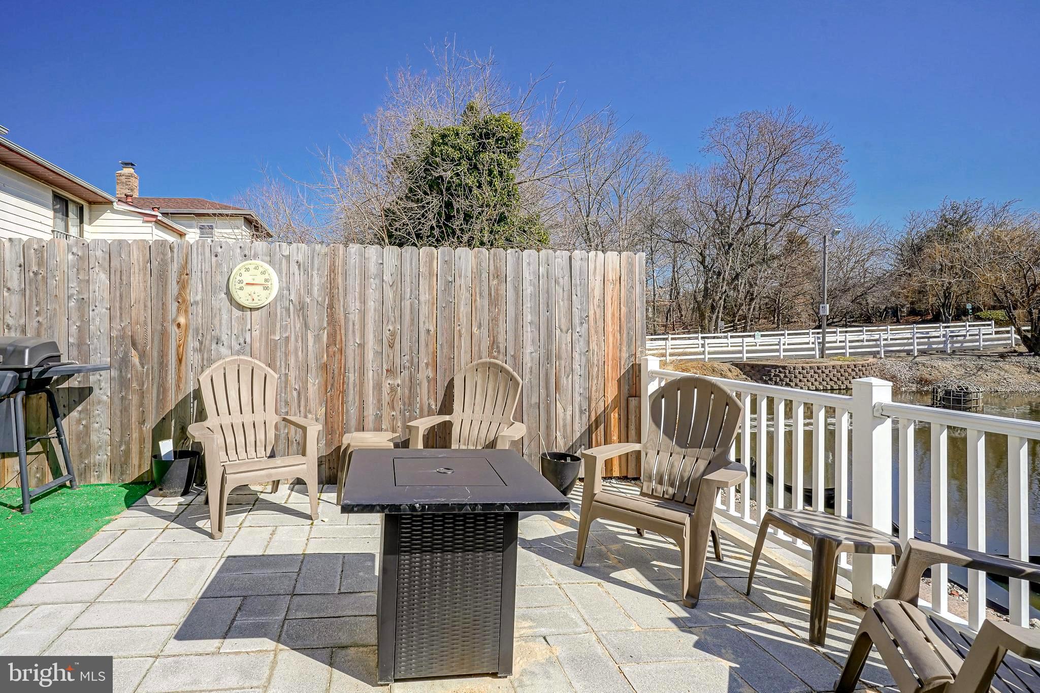 5 Via Cascata Drive Clementon, NJ 08021 - Photo 25 of 26 a view of a patio with a table and chairs