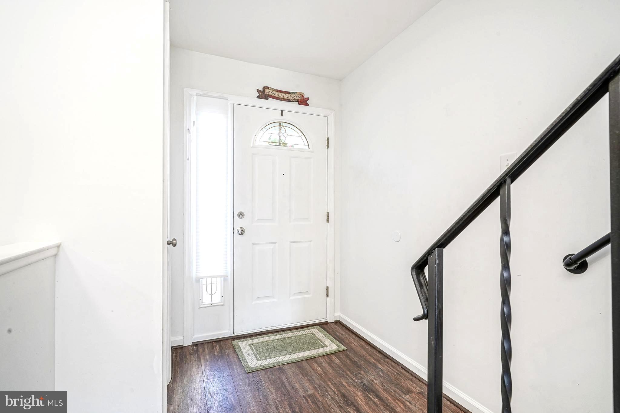 5 Via Cascata Drive Clementon, NJ 08021 - Photo 6 of 26 a view of a hallway with wooden floor and staircase