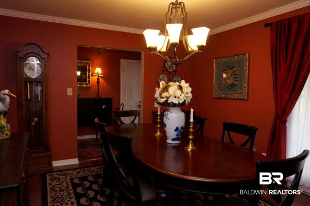 500 Oak Ridge Court West Daphne, AL 36526 - Photo 5 of 24 Richly appointed dining room has hardwood floors