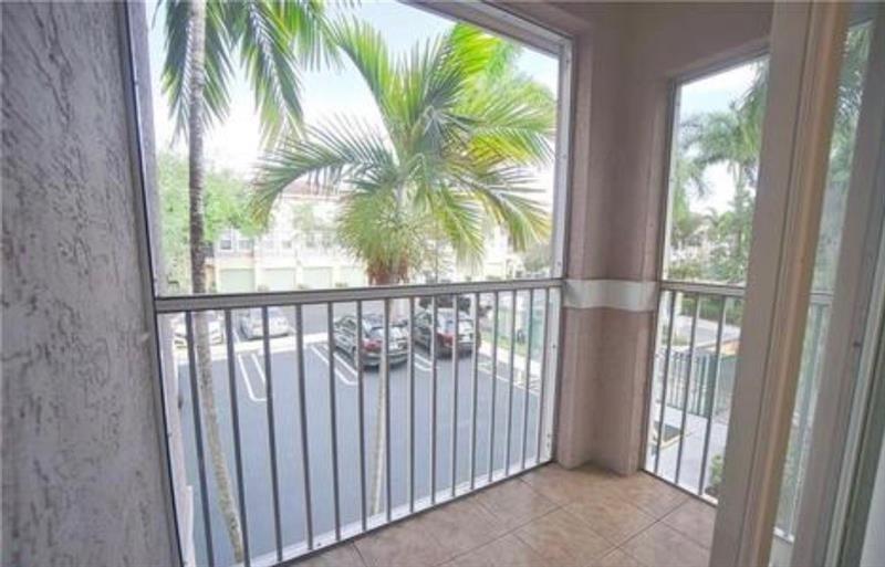 6540 West Sample Road, Unit 6540 Coral Springs, FL 33067 - Photo 16 of 23 screened balcony 6540