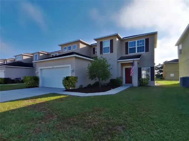 front view of house with a yard