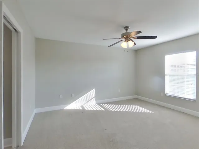 a view of a big room with carpet