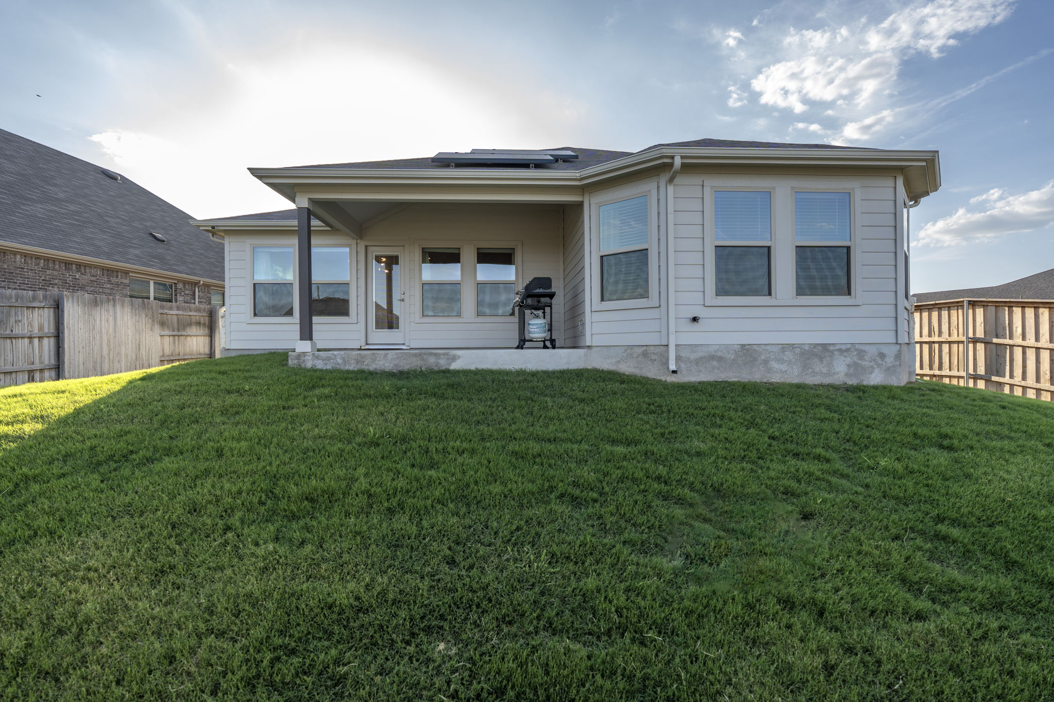 463 Oleander Loop Buda, TX 78610 - Photo 17 of 34 a view of house with a yard