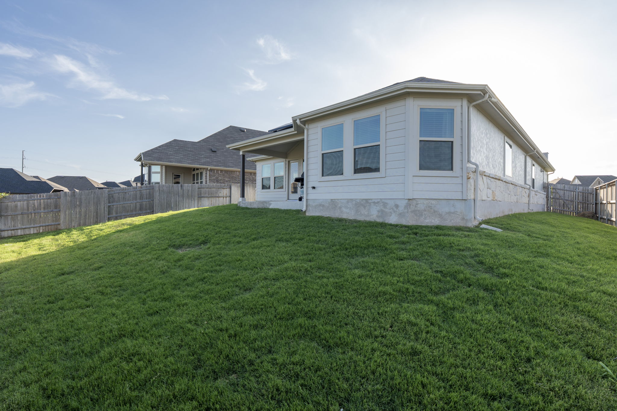 463 Oleander Loop Buda, TX 78610 - Photo 18 of 34 a house view with a outdoor space