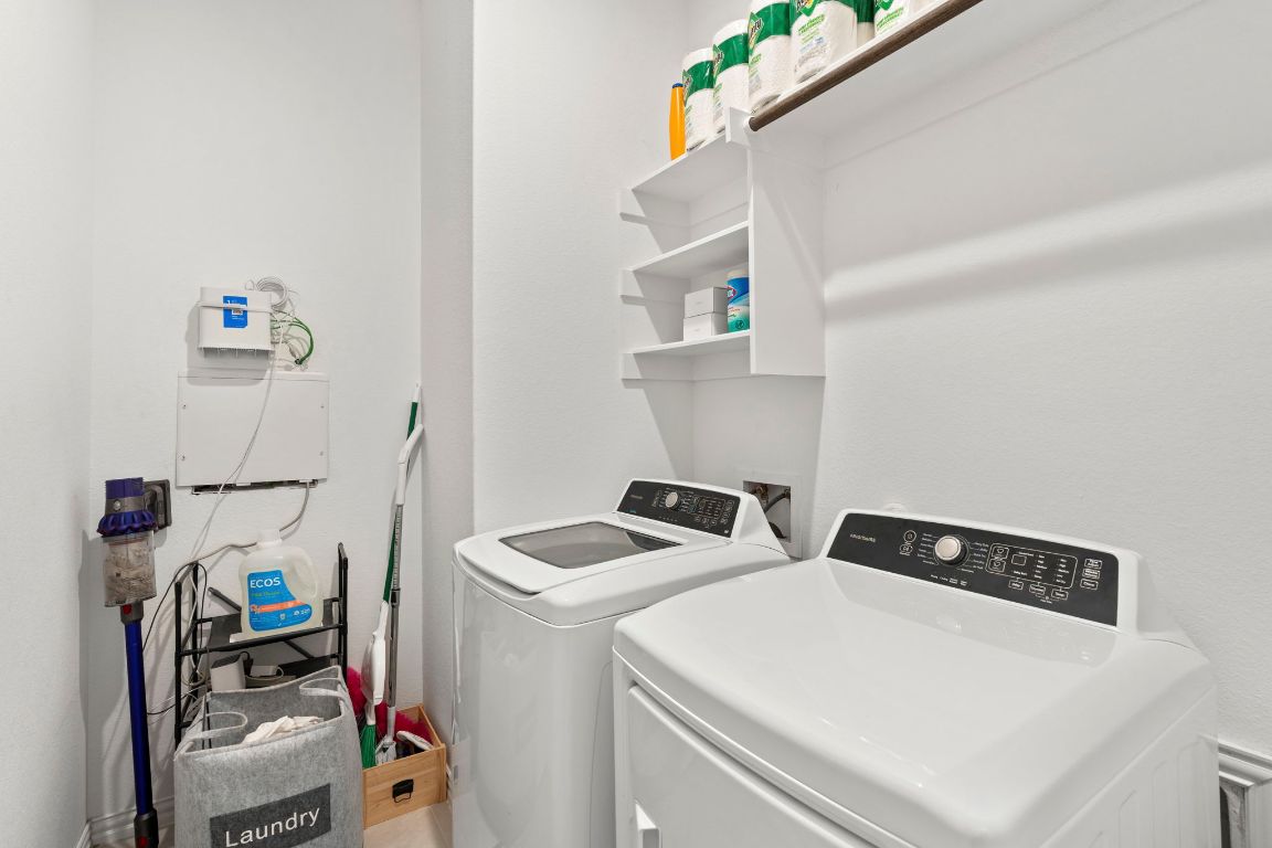 463 Oleander Loop Buda, TX 78610 - Photo 24 of 34 Laundry room with separate washer and dryer