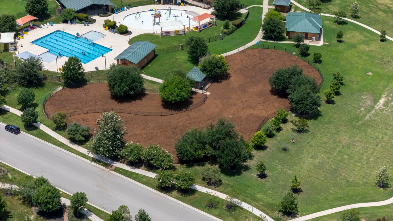 463 Oleander Loop Buda, TX 78610 - Photo 29 of 34 Aerial view of a pool