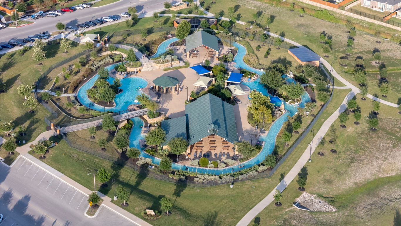 463 Oleander Loop Buda, TX 78610 - Photo 32 of 34 Aerial view of property's location featuring a pool