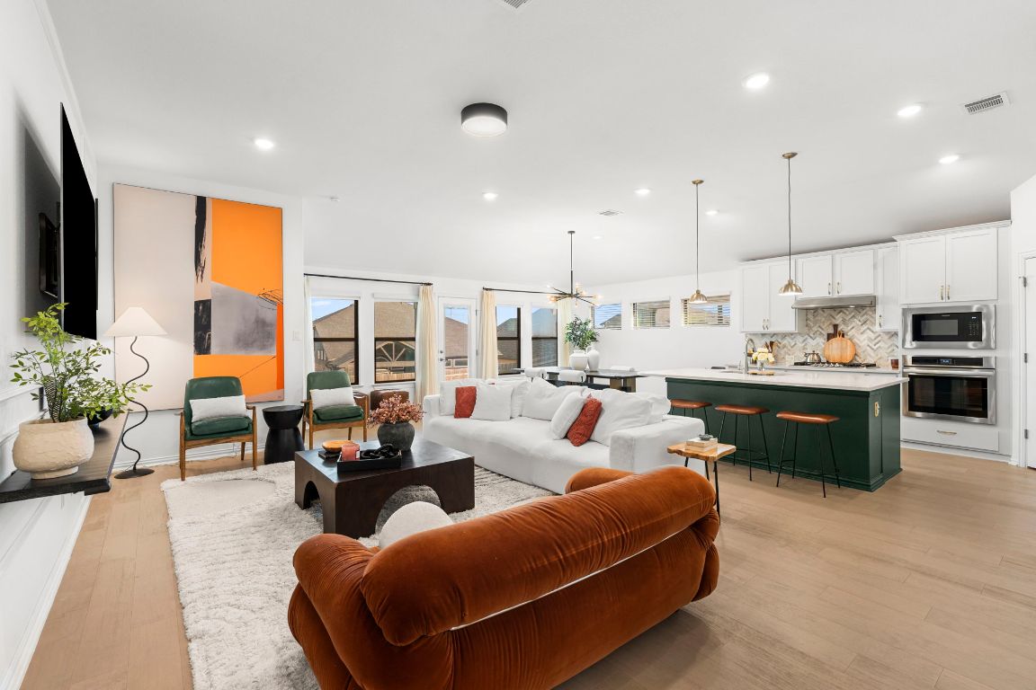 463 Oleander Loop Buda, TX 78610 - Photo 7 of 34 Living area featuring light wood-type flooring and recessed lighting