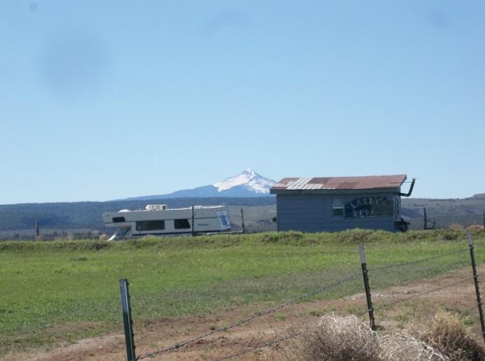Tbd Tbd Co-145 Redvale, CO 81431 - Photo 3 of 7 a view of a house with a yard and a fence