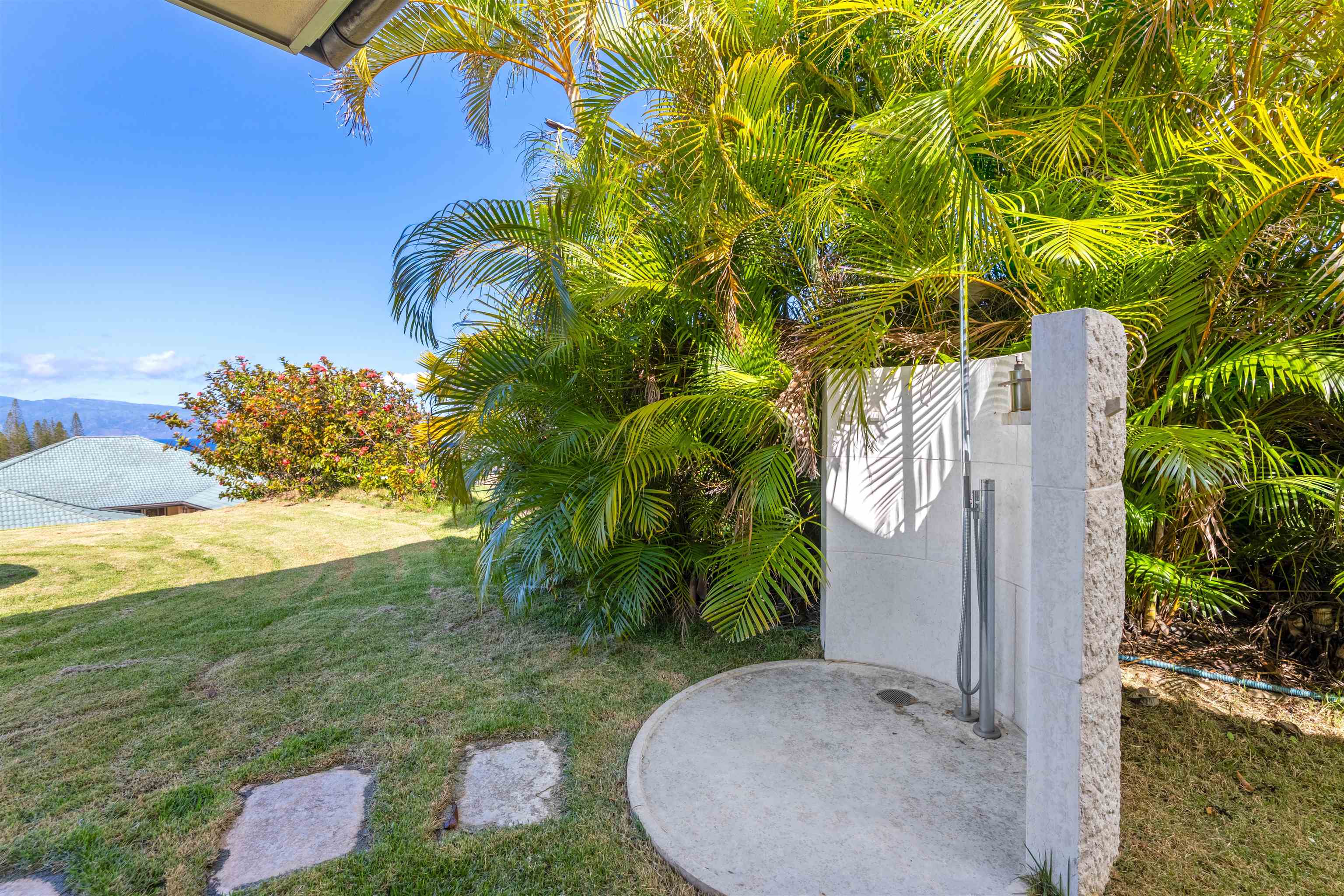 232 Crestview Road Lahaina, HI 96761 - Photo 22 of 45 a backyard of a house with lots of green space