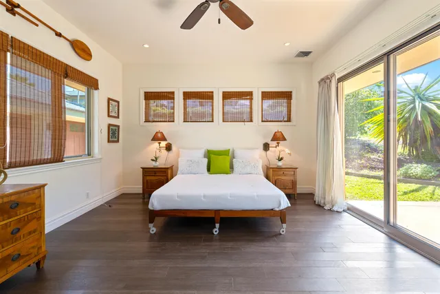 a bed room with a bed and a view