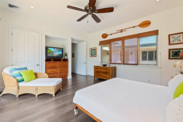 a view of a living room with a wooden floor