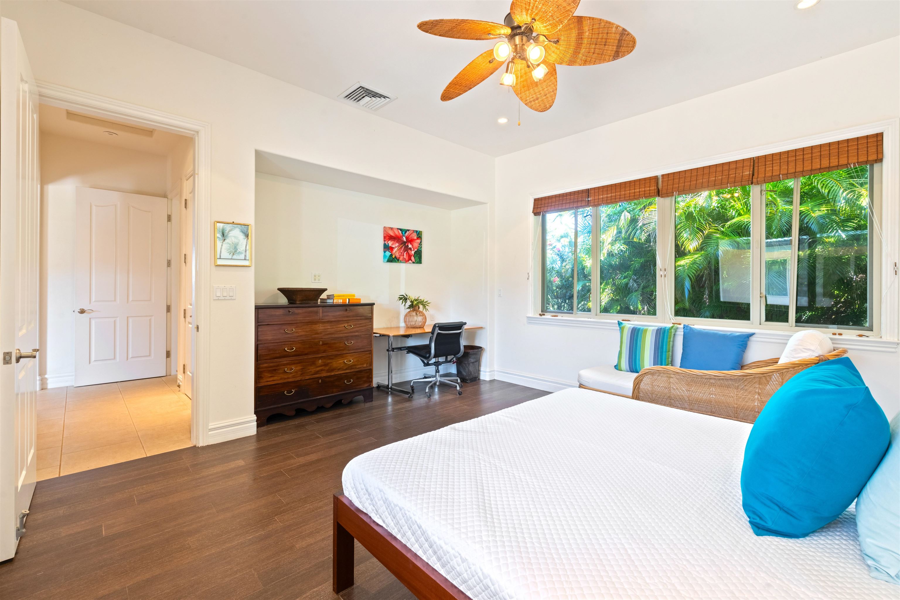 232 Crestview Road Lahaina, HI 96761 - Photo 36 of 45 a bedroom with a bed and wooden floor