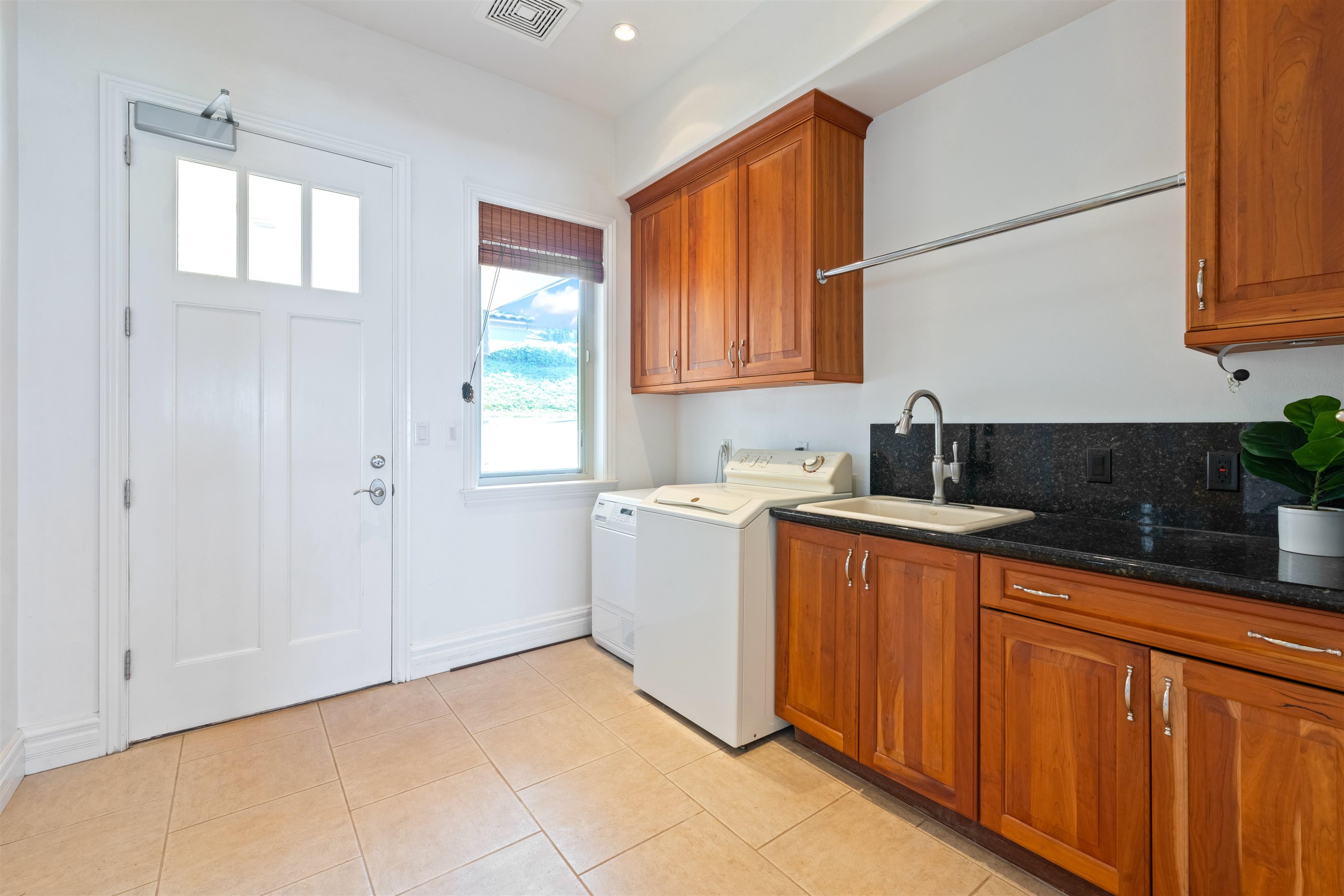 232 Crestview Road Lahaina, HI 96761 - Photo 42 of 45 a kitchen with a sink cabinets and window