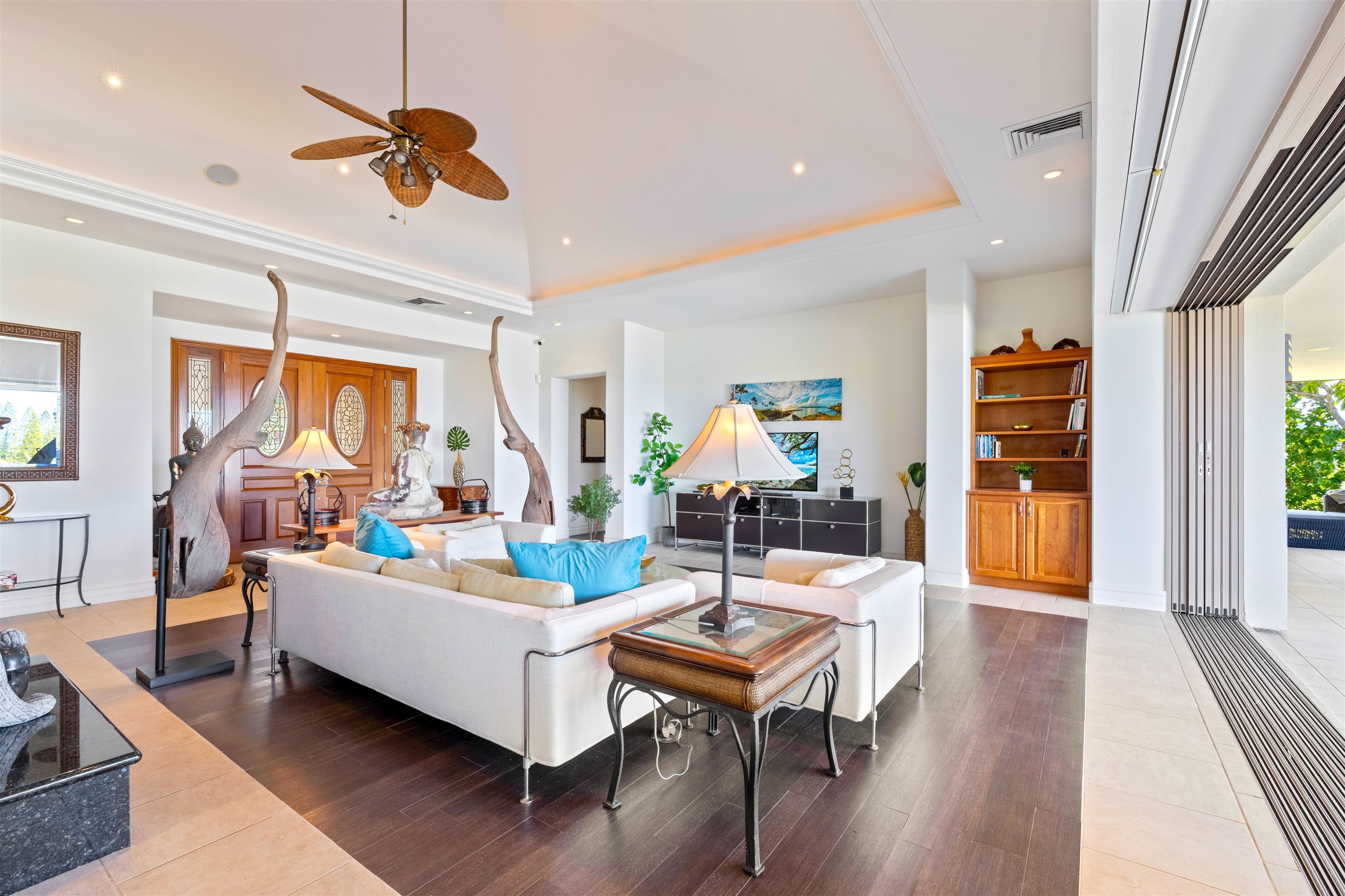 232 Crestview Road Lahaina, HI 96761 - Photo 5 of 45 a living room with fireplace furniture and a wooden floor