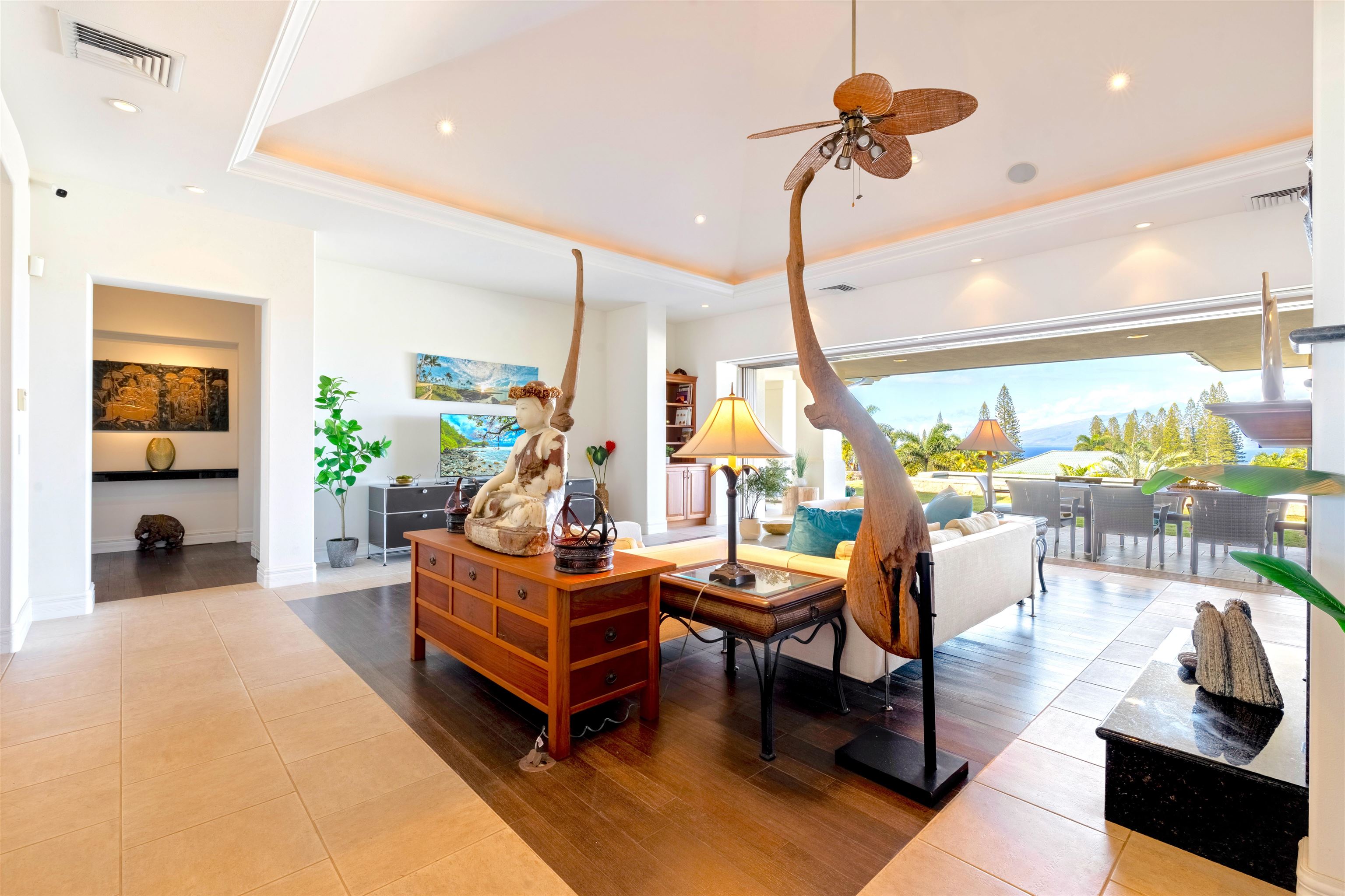 232 Crestview Road Lahaina, HI 96761 - Photo 8 of 45 a living room with furniture ceiling fan and a large window