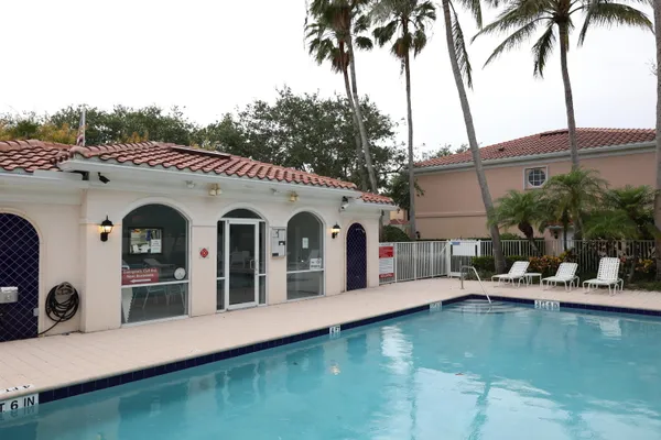 a view of a house with swimming pool