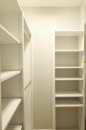 a view of a hallway with closet