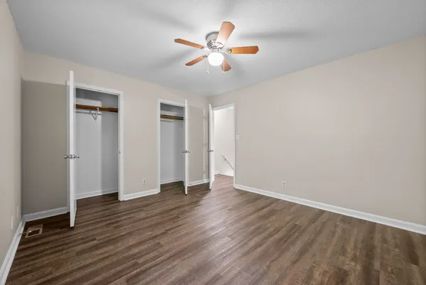 a balcony with wooden floor