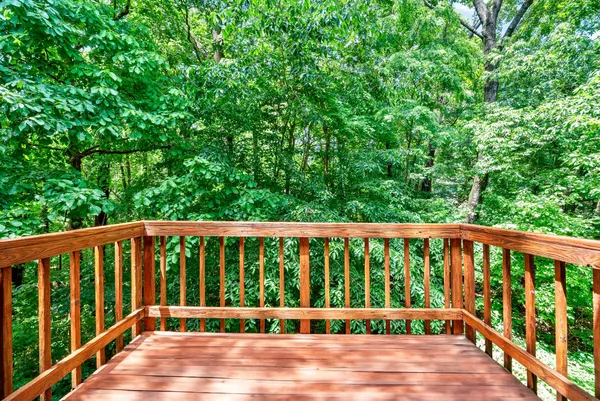 a view of a brick house with a balcony