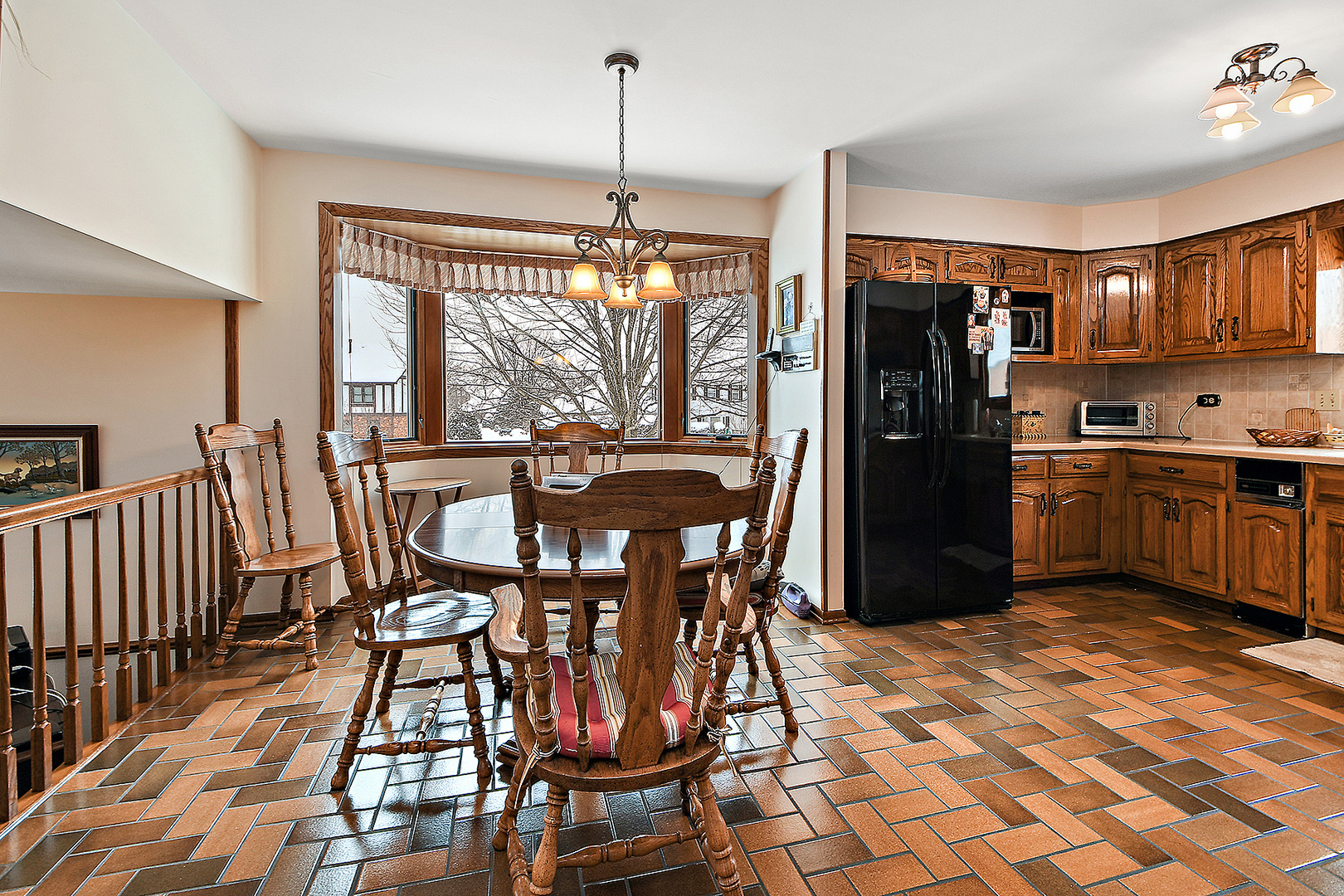 15 87th Street Burr Ridge, IL 60527 - Photo 13 of 34 a view of a dining room with furniture window and outside view