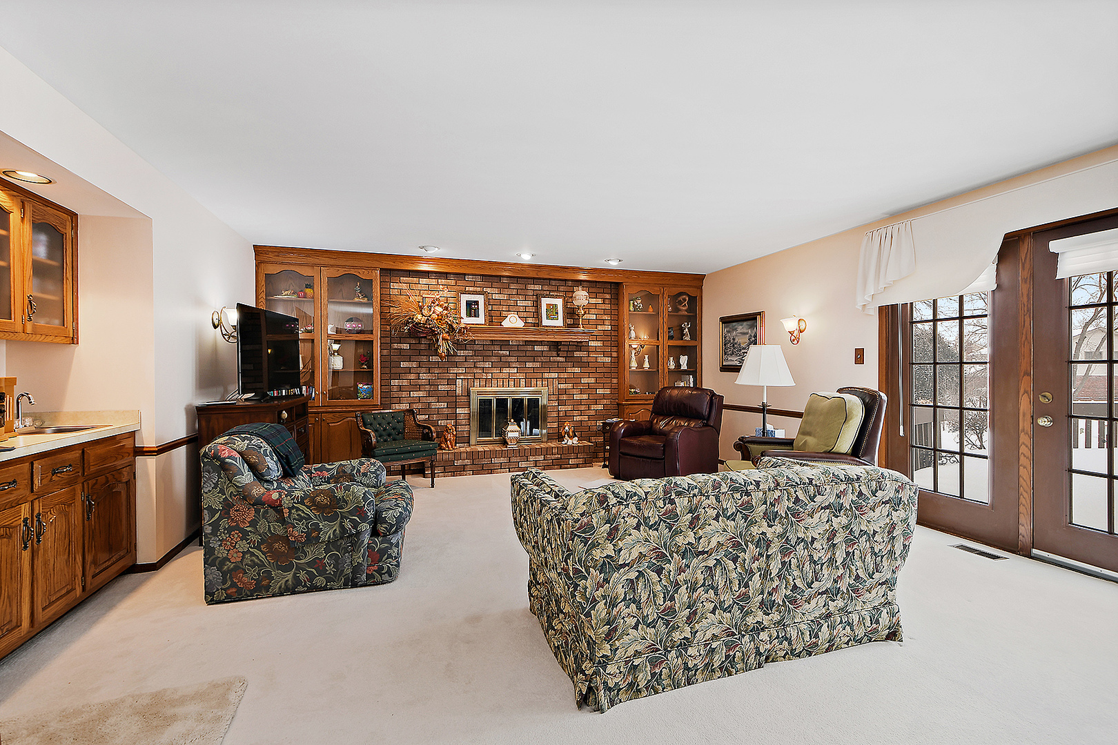 15 87th Street Burr Ridge, IL 60527 - Photo 14 of 34 a living room with furniture and a floor to ceiling window