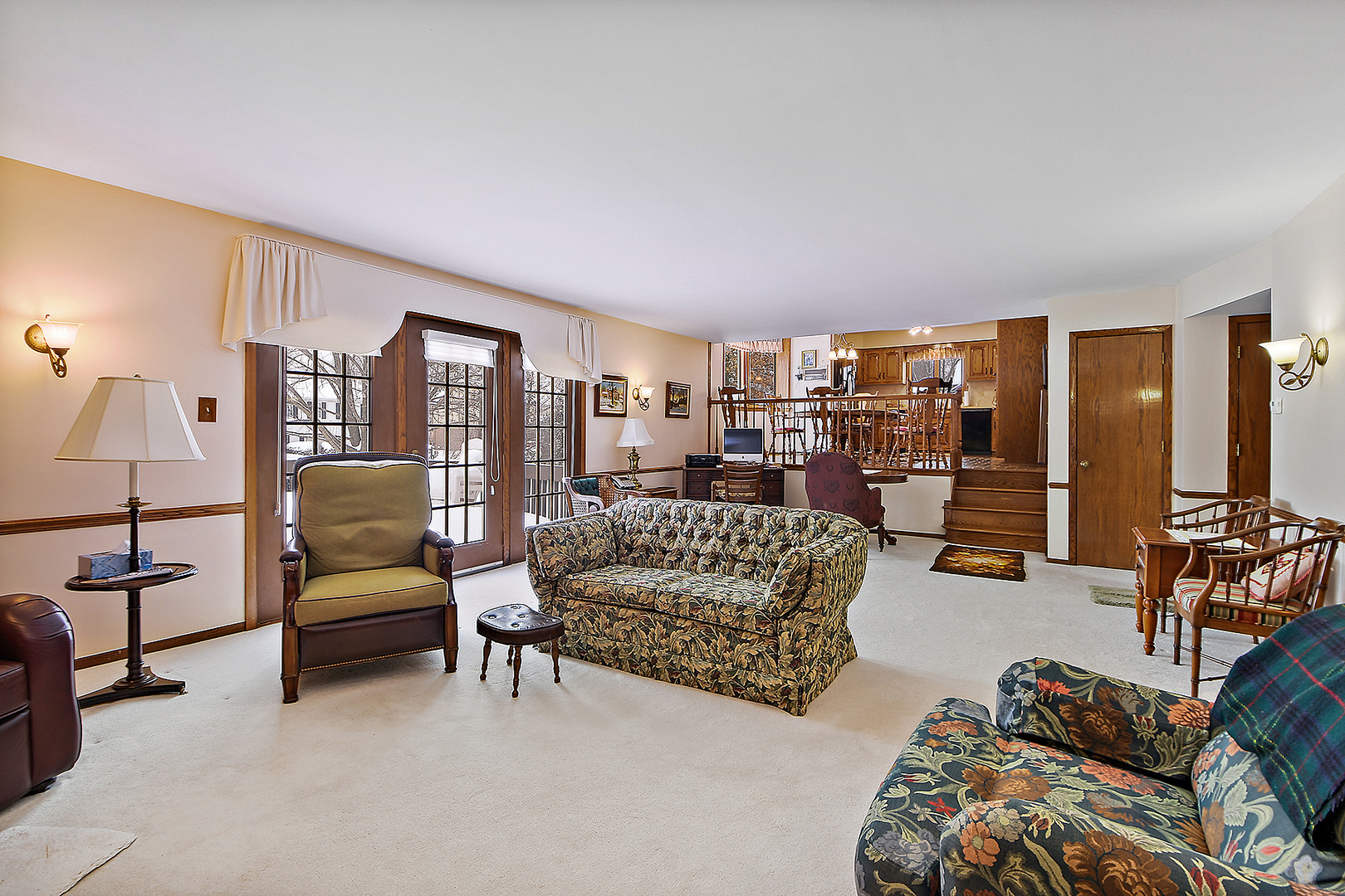 15 87th Street Burr Ridge, IL 60527 - Photo 16 of 34 a living room with furniture and a flat screen tv
