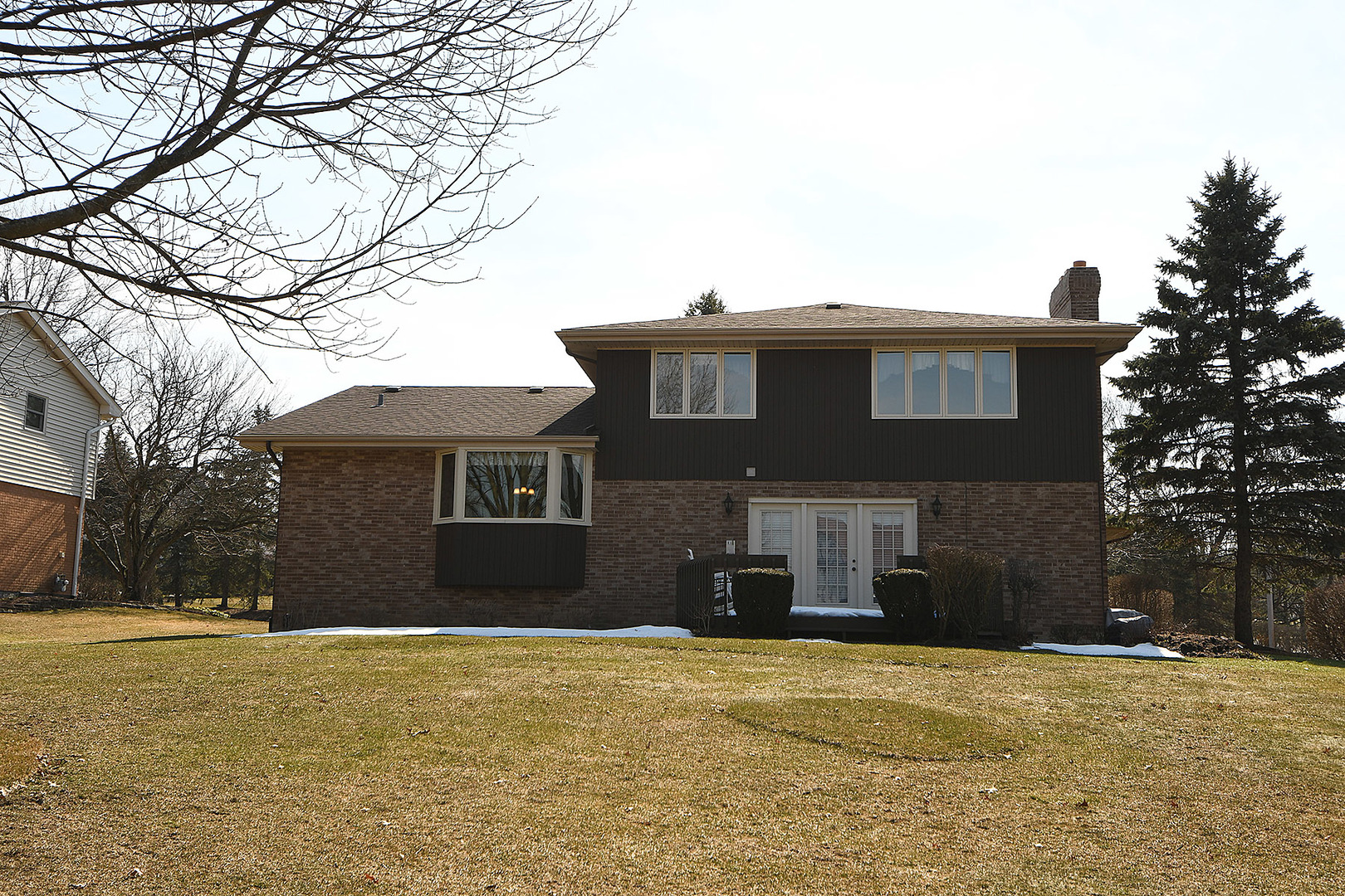 15 87th Street Burr Ridge, IL 60527 - Photo 33 of 34 a front view of a house with a yard