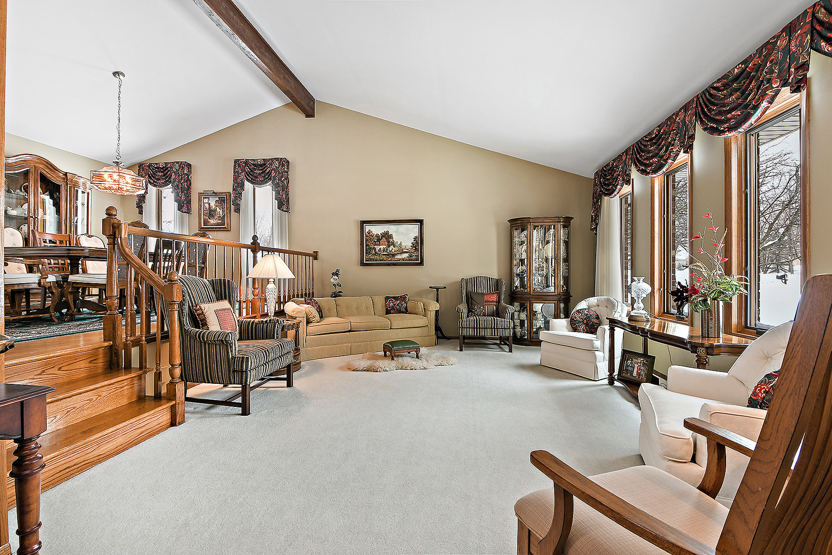 15 87th Street Burr Ridge, IL 60527 - Photo 6 of 34 a living room with furniture and a flat screen tv