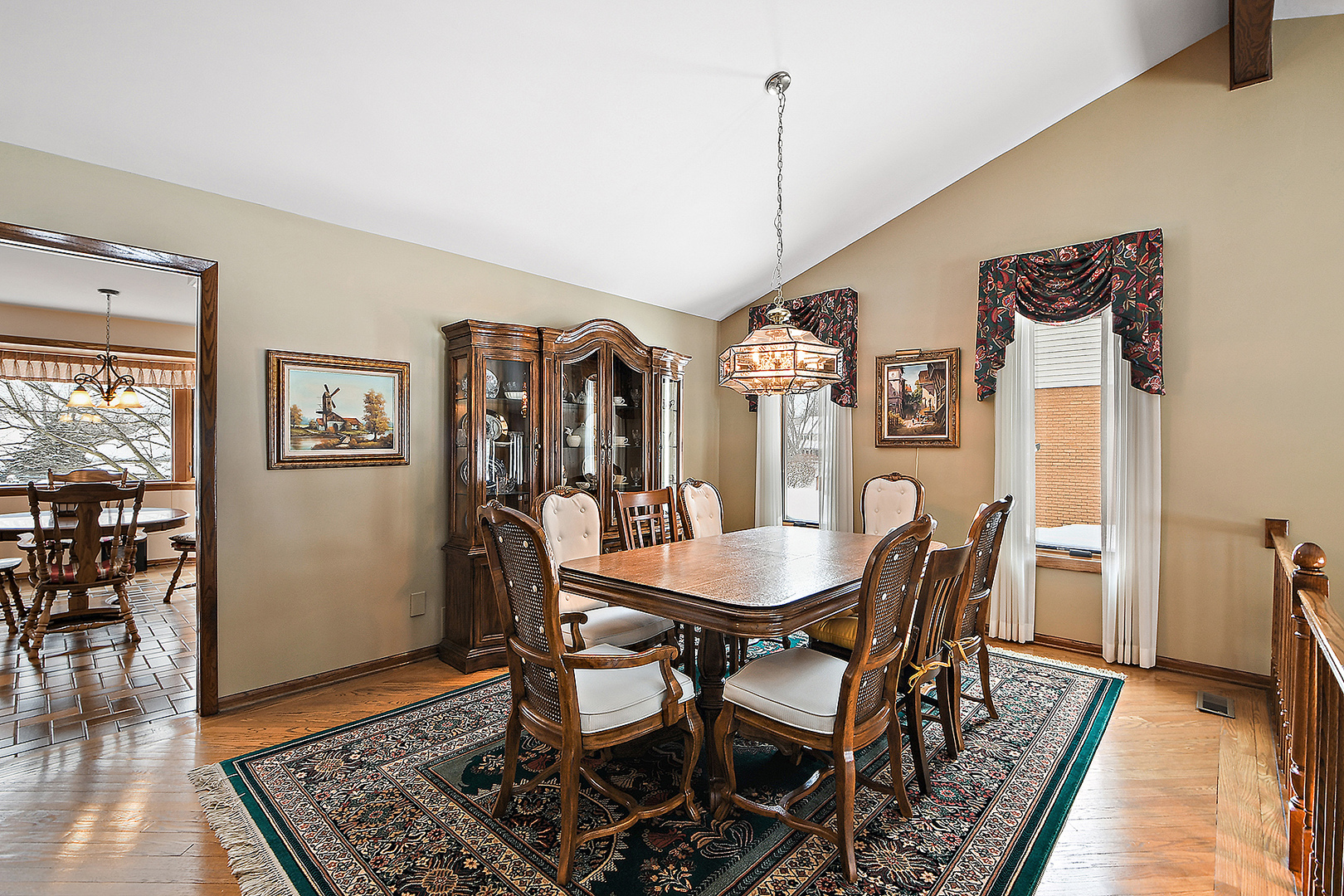 15 87th Street Burr Ridge, IL 60527 - Photo 9 of 34 a view of a dining room with furniture window and wooden floor