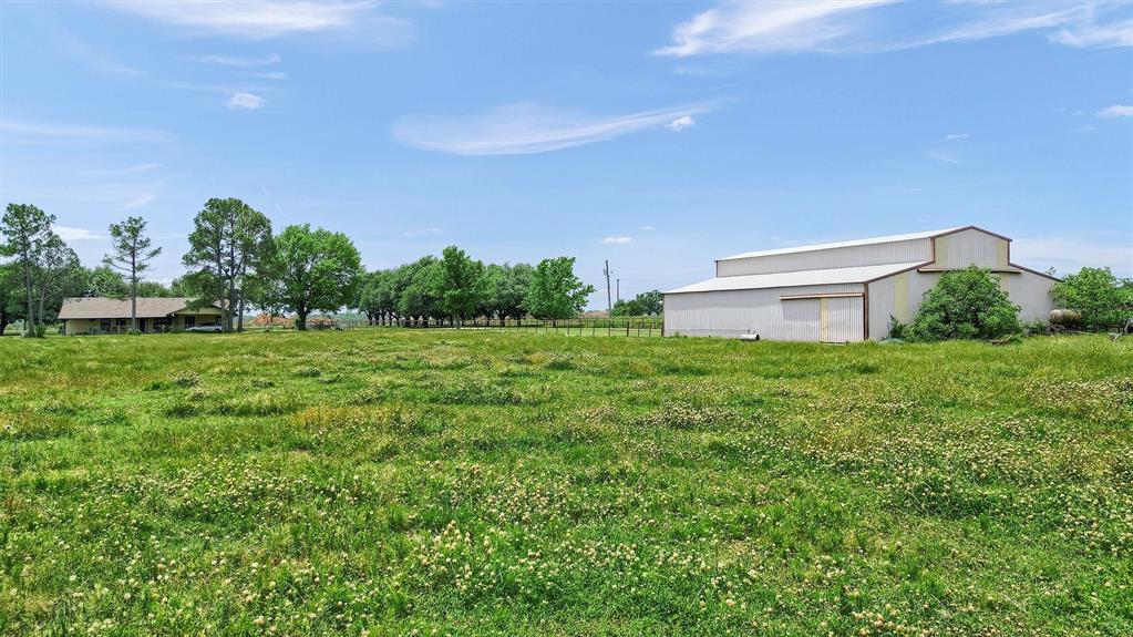 12153 Mustang Road Pilot Point, TX 76258 - Photo 17 of 23 a house view with a garden space