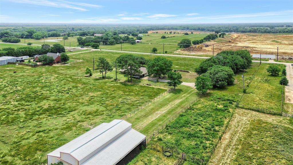 12153 Mustang Road Pilot Point, TX 76258 - Photo 19 of 23 a view of a city with ocean view