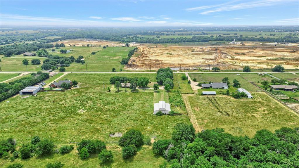 12153 Mustang Road Pilot Point, TX 76258 - Photo 2 of 23 a view of a city