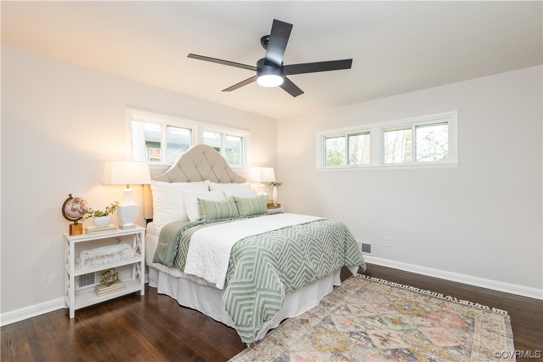 7714 Cherokee Road Richmond, VA 23225 - Photo 25 of 48 a bedroom with a bed and a window