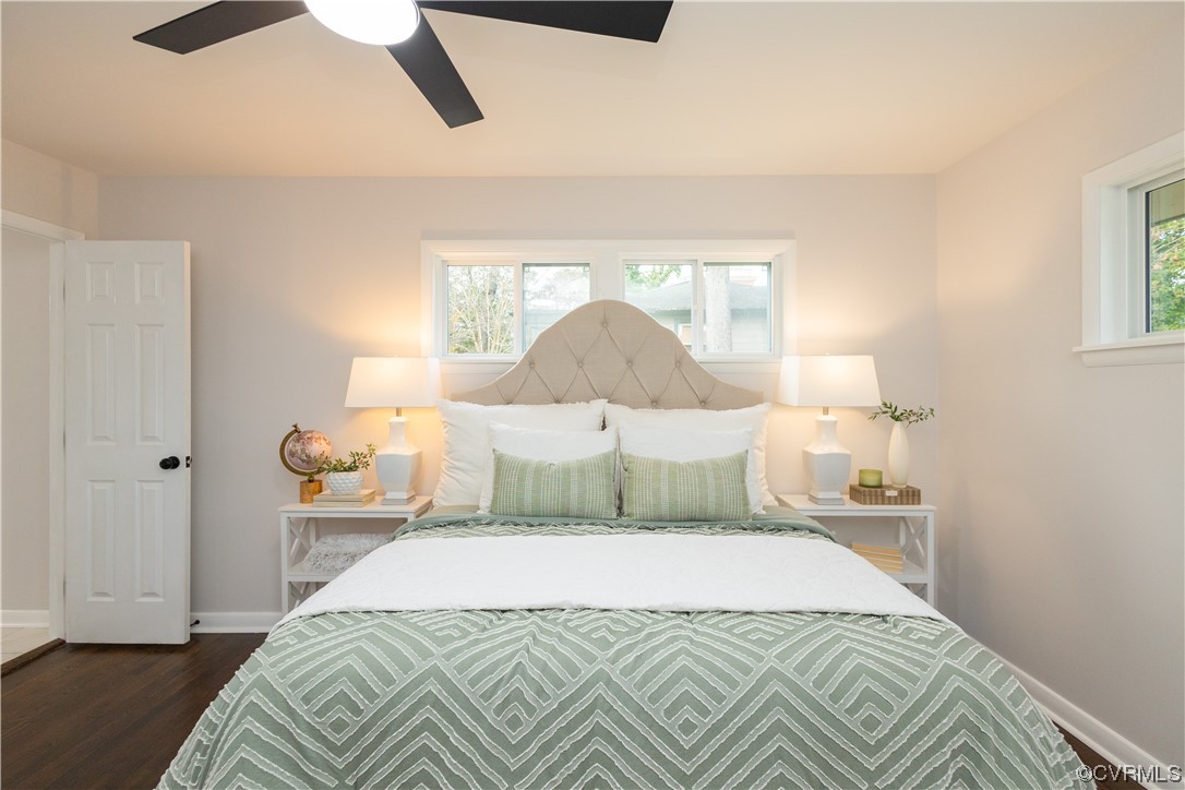 7714 Cherokee Road Richmond, VA 23225 - Photo 28 of 48 a bedroom with a bed and night stand