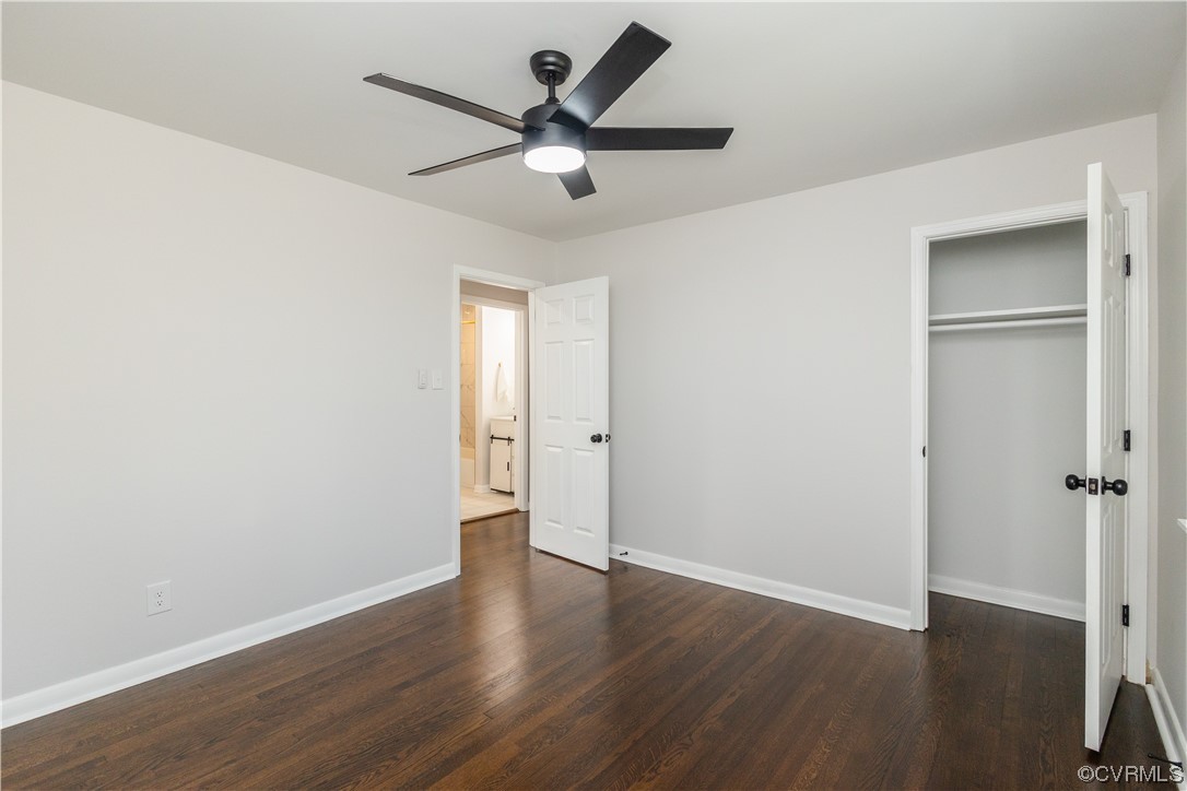 7714 Cherokee Road Richmond, VA 23225 - Photo 38 of 48 an empty room with wooden floor and a ceiling fan