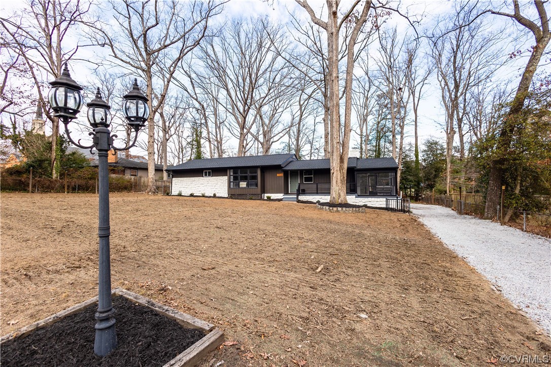 7714 Cherokee Road Richmond, VA 23225 - Photo 4 of 48 a view of a house with a yard