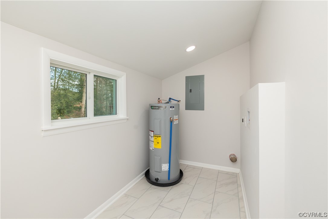 7714 Cherokee Road Richmond, VA 23225 - Photo 41 of 48 a bathroom with a light fixture and a window