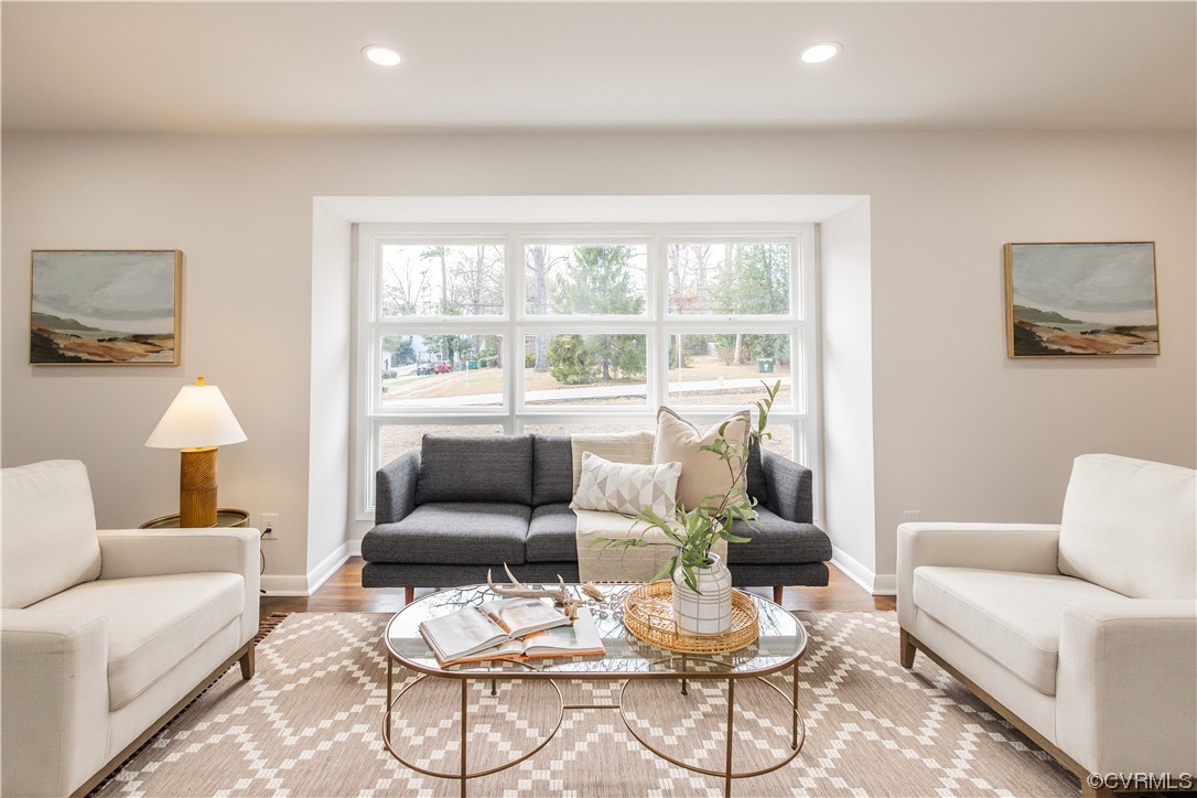 7714 Cherokee Road Richmond, VA 23225 - Photo 8 of 48 a living room with furniture and a large window