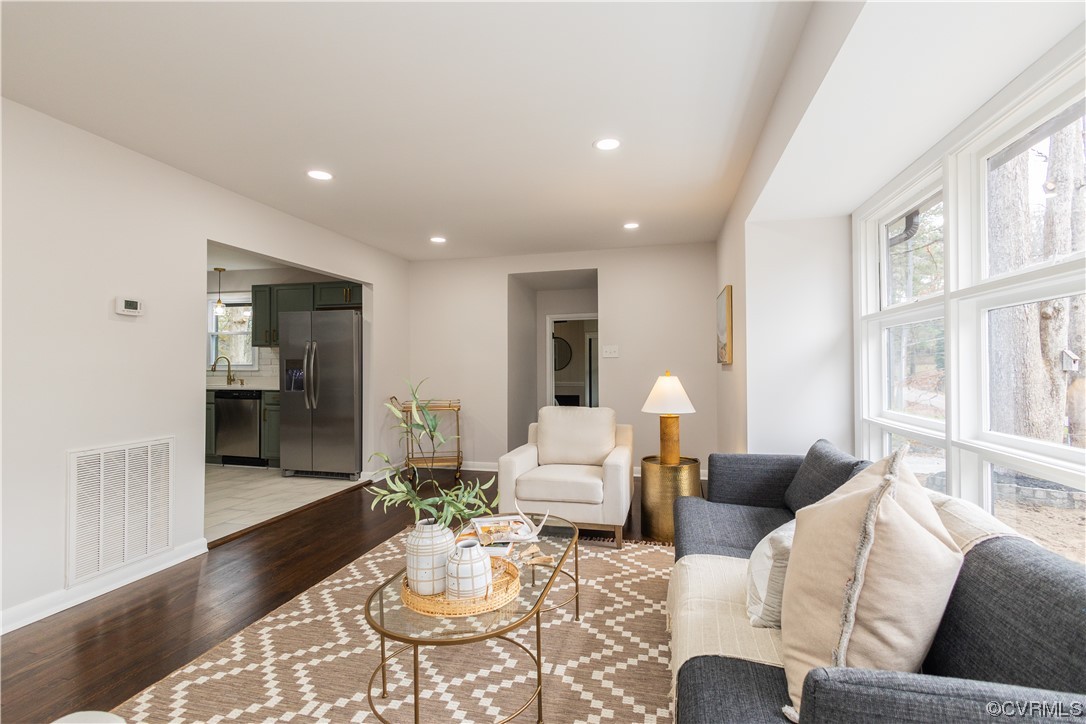 7714 Cherokee Road Richmond, VA 23225 - Photo 9 of 48 a living room with furniture and wooden floor