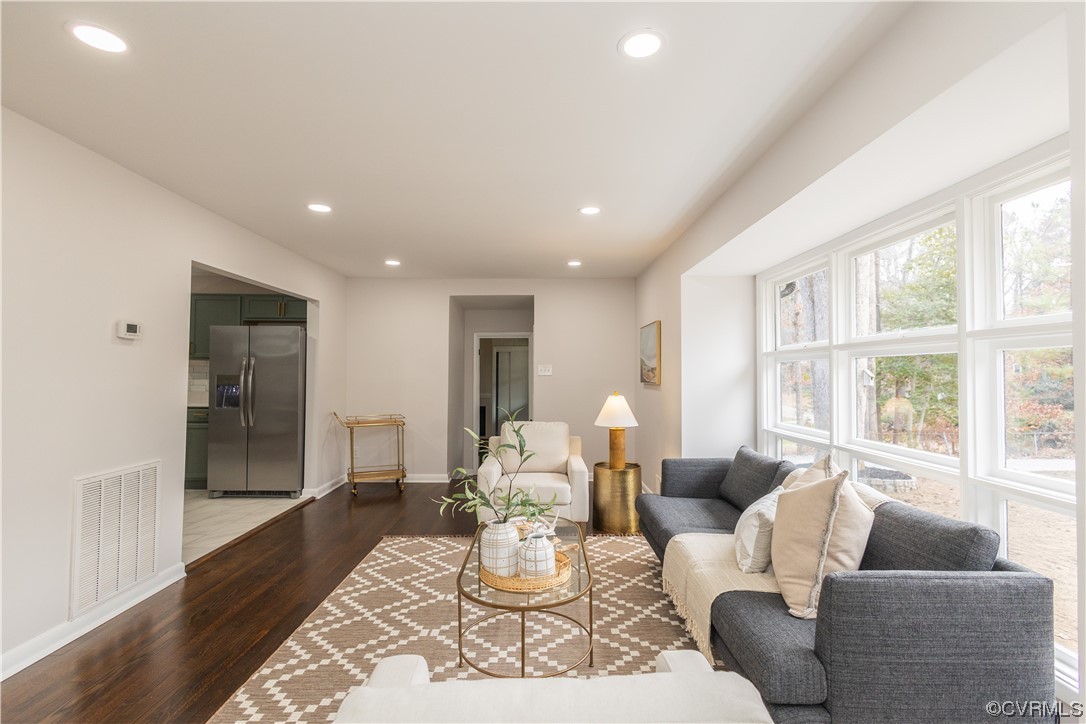 7714 Cherokee Road Richmond, VA 23225 - Photo 10 of 48 a living room with furniture and a large window