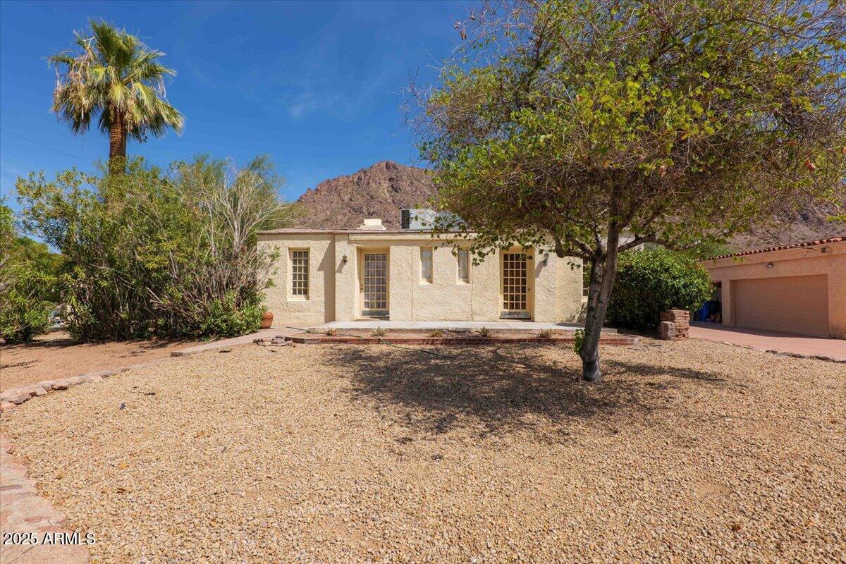 5702 East Camelback Road, Unit MEXICAN Phoenix, AZ 85251 - Photo 19 of 45 a house with a tree in front of it